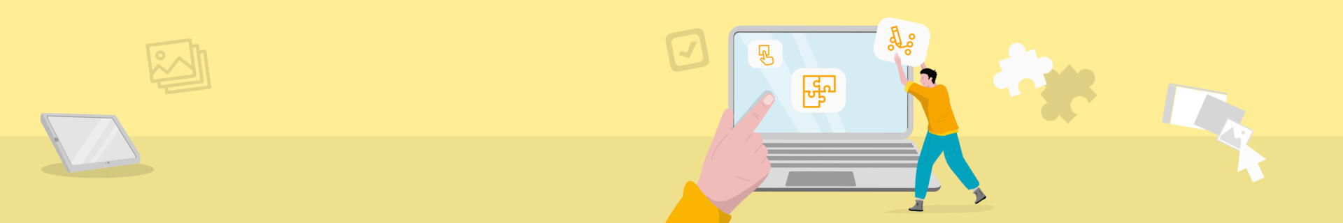 Person platziert Grafik auf Laptopbildschirm, während ein anderer Laptop im Hintergrund steht.