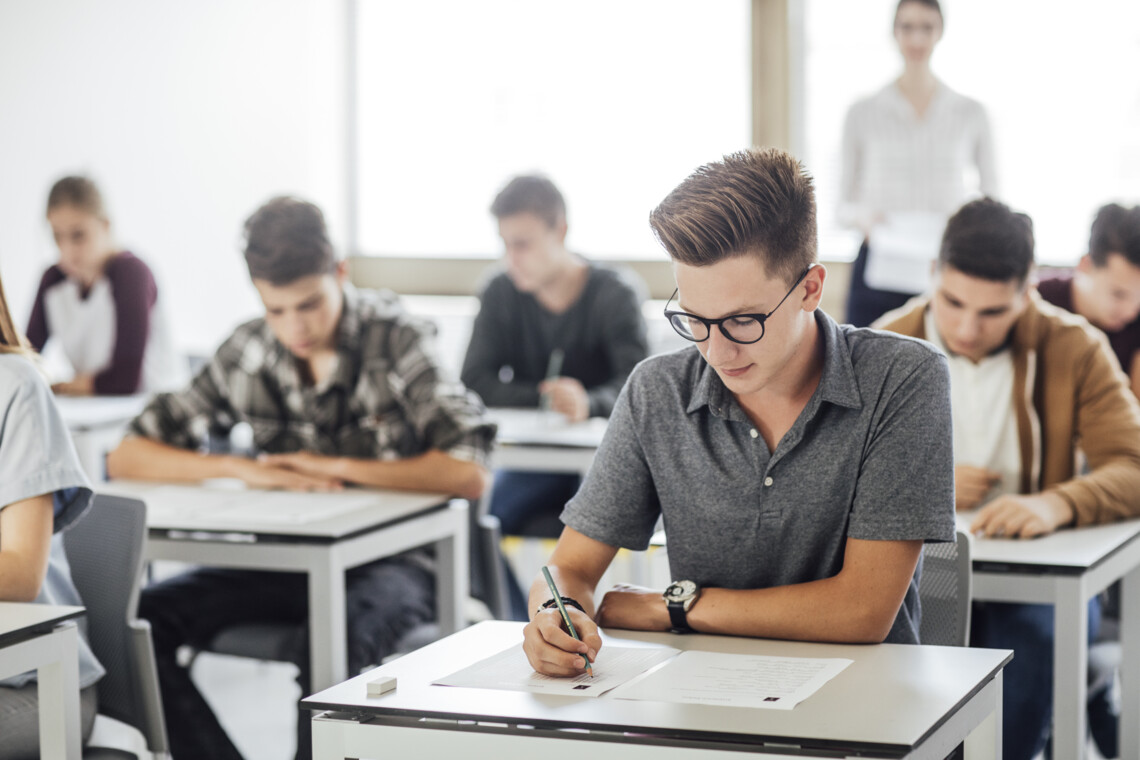 Group of high school students having test at classroom.; Shutterstock ID 714476182