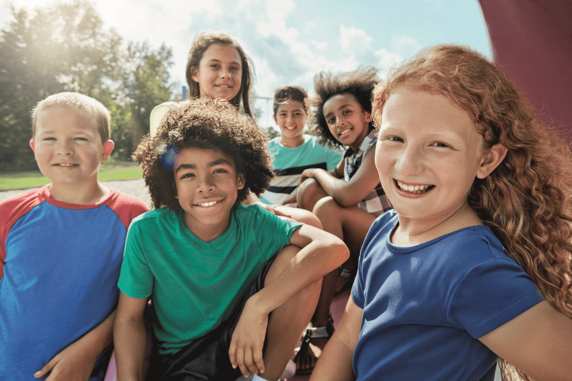 Kids, group and portrait on playground in park to relax with friends in summer on vacation. Happy, holiday and children together for camp, games or smile outdoor at middle school recess or break.
Kids, group and portrait on playground in park to relax with friends in summer on vacation. Happy, holiday and children together for camp, games or smile outdoor at middle school recess or break.